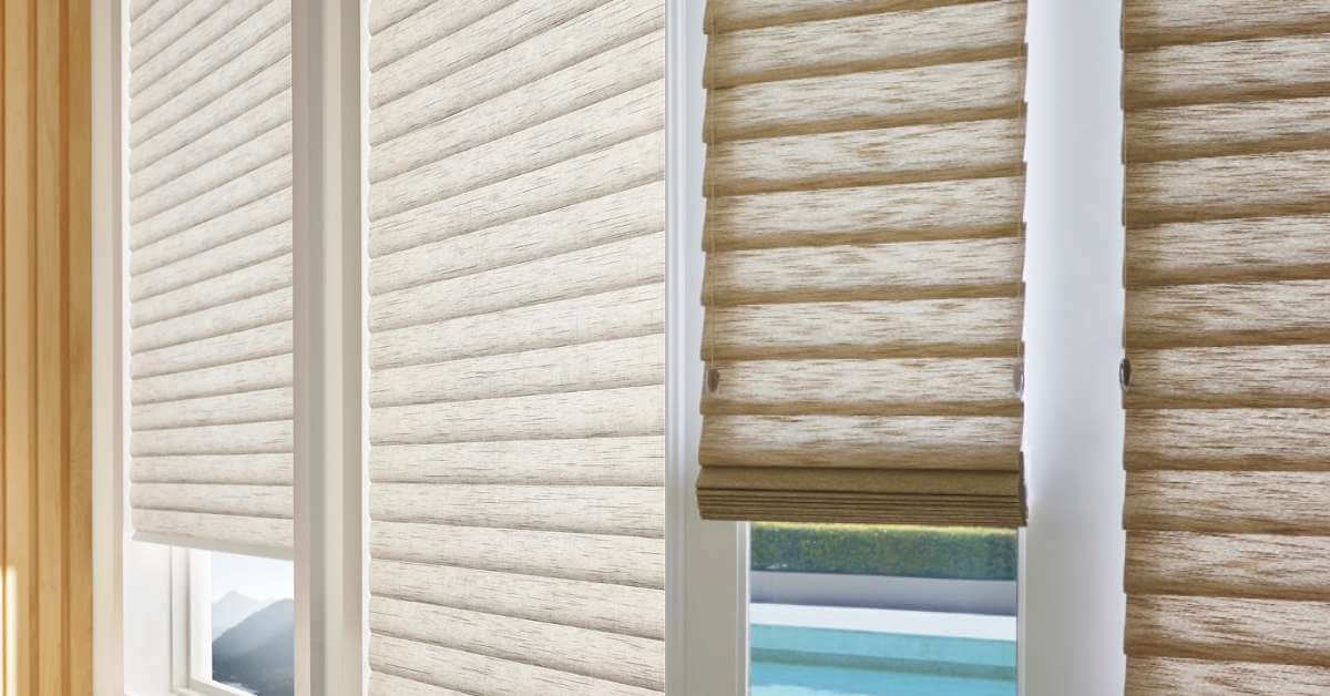 This is a photo of a cellular shades vs. Roman shades comparison